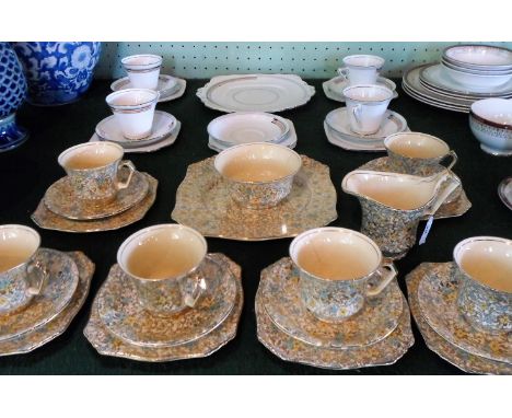 A Royal Winton Grimwades part-tea service, comprising: six trios, sandwich plate, sugar bowl and milk jug, together with a Be