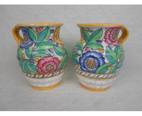 A pair of Crown Ducal vases, designed by Charlotte Rhead in the Persian Rose pattern, number 4040, printed and tube-lined mar