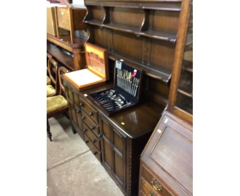 An Ercol dresser fitted four drawers 