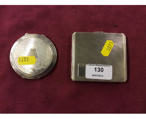 A silver engine turned cigarette case and a silver engine turned compact