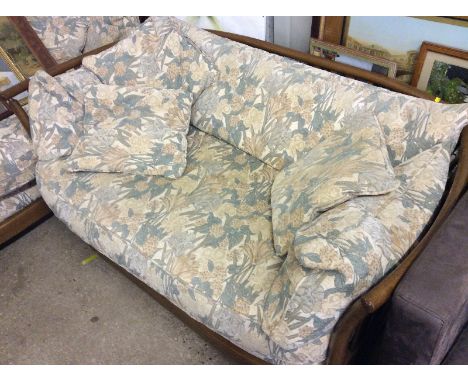 An Ercol flat back two seater settee