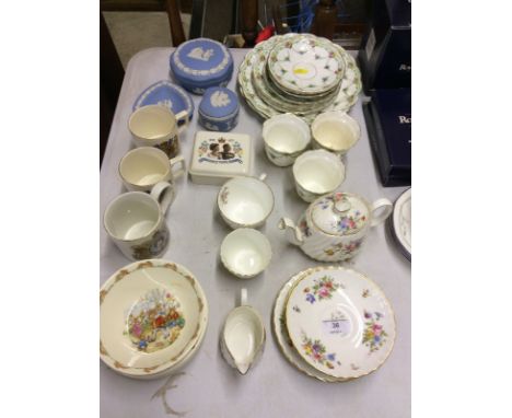 A Minton 'Marlow' patterned teapot and matching teacup and saucers; three commemorative mugs; a Royal Doulton Bunnikins baby'