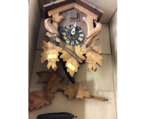 A carved Black Forest cuckoo clock