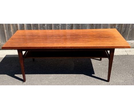 A mid century rosewood coffee table, with single shelf below, 53cm high , 14cm long, 58cm wide 