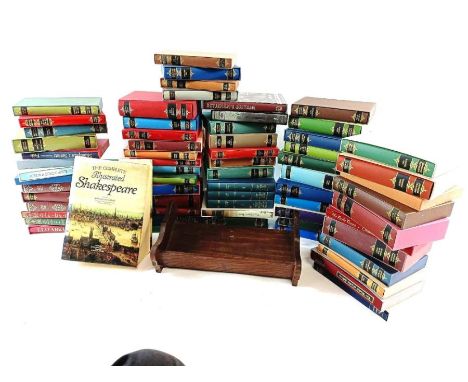 A large collection of Folio Society books to include Trollope, along with an oak book shelf 