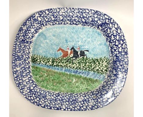 A vintage Hinchcliffe &amp; Barber platter, decorated with two huntsmen on horseback, on a green and blue sponge background, 