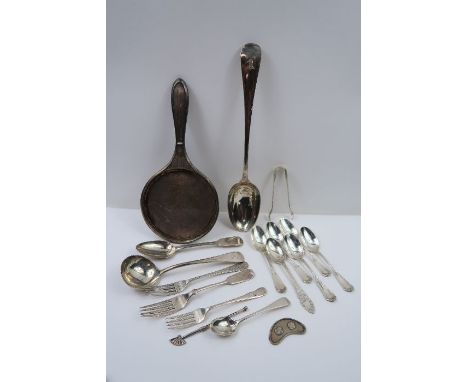 A silver basting spoon, London, 1892, Francis Higgins II; a silver sauce ladle; a swizzle stick with a fan top, marked 'silve