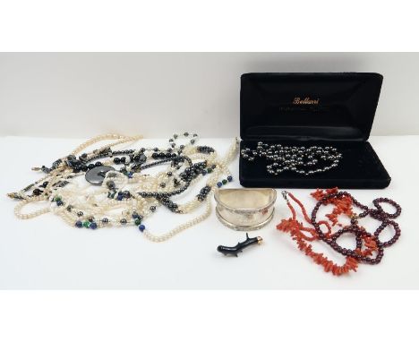 Bellarri; a hematite and gold coloured bead necklace, 61cm long, boxed, a silver Lindisfarne pattern napkin ring, of D shape,