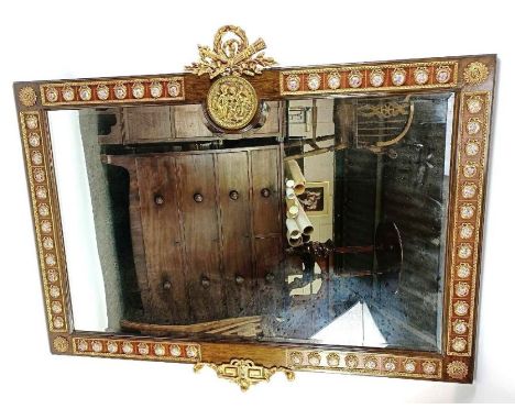 A 20th century mahogany mirror, the border set with ceramic rondels, with a gilded outline and moldings throughout, 111cm hig