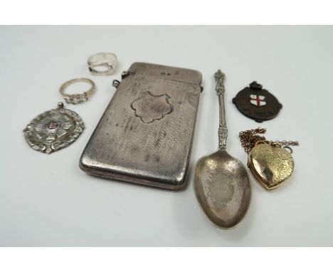 A silver card case, Birmingham, 1916, Joseph Gloster Ltd, of rectangular form, with line decoration and vacant cartouche, 47.