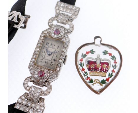 PLATINUM ART DECO DIAMOND & RUBY LADIES COCKTAIL WATCH, the rectangular dial with Arabic numerals together with late Victoria