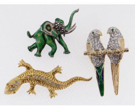 THREE ANIMAL DESIGN BAR BROOCHES to include enamel elephant, stone set lizard and pair of parrots (3) Comments: Stone missing