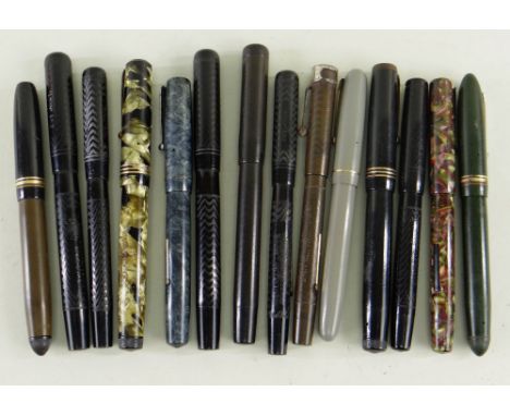 ASSORTED SWAN FOUNTAIN PENS, including six black pens with engine turned decoration, a self-filler, and three marbled pens (1