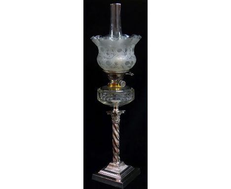 VICTORIAN ELECTROPLATED OIL LAMP, the Corinthian column base supporting clear faceted glass reservoir, Hinks lever no. 2 wick