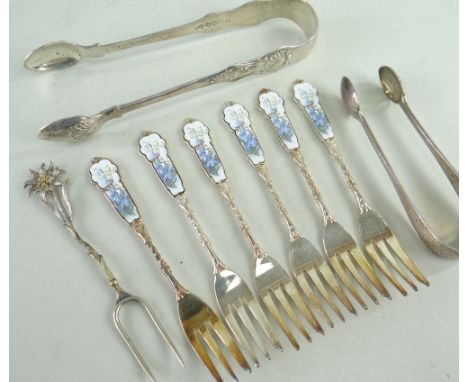ASSORTED SILVER comprising two Victorian sugar tongs including one bright cut engraved example with crest of lion with anchor