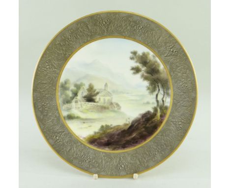 ROYAL WORCESTER CABINET PLATE PAINTED WITH WELSH CHURCH SCENE, landscape with two figures, titled to base 'Llanelltyd Church'