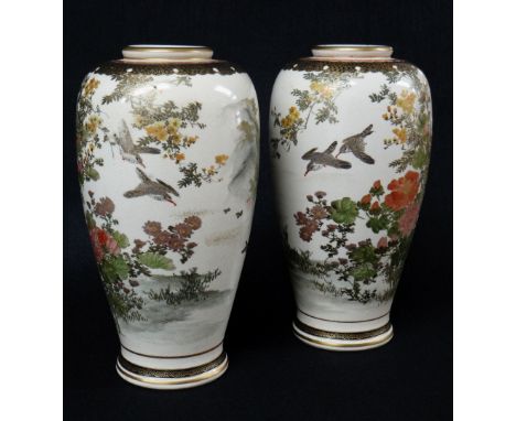 PAIR OF JAPANESE SATSUMA VASES, painted with Peony, Prunus, and Chrysanthemum, with birds in flight, reversed with a mountain