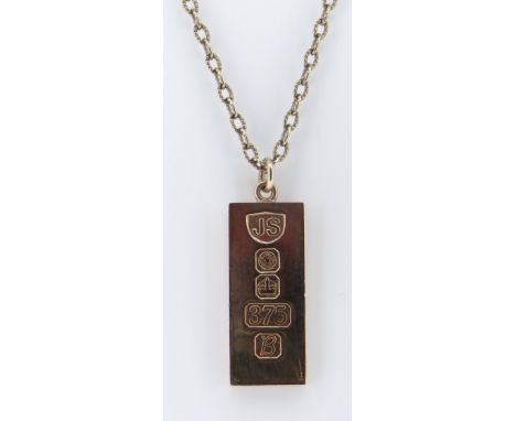 9CT GOLD RECTANGULAR INGOT PENDANT on 9ct gold chain, 62cms long, 42.0gms overall Provenance: deceased estate London, consign