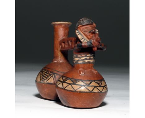 Pre-Columbian, Peru, Inca, ca. 1300 to 1500 CE. A double-chambered terracotta vessel featuring a standing man who assumes the