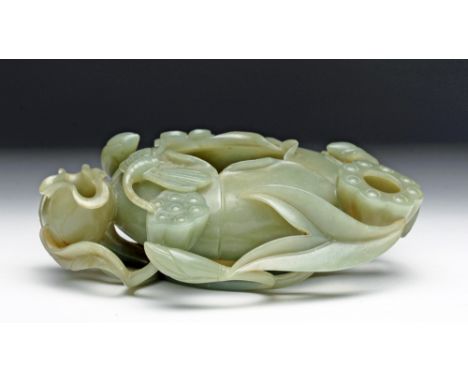 China, Qing Dynasty, late 19th to early 20th century CE.  A Chinese jade brush washer in the form of a lotus with tendrils, f