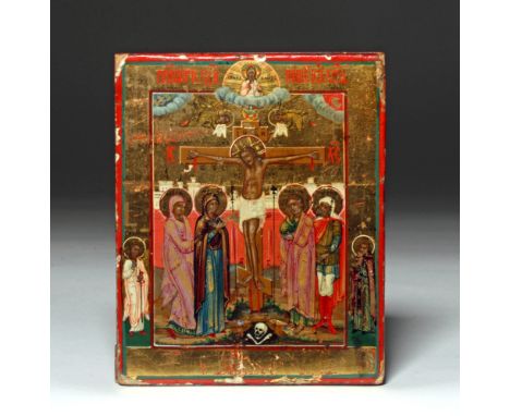 Russia, ca. 19th century CE. A small and brilliantly painted Russian icon on wood depicting the Crucifixion with bystanders, 