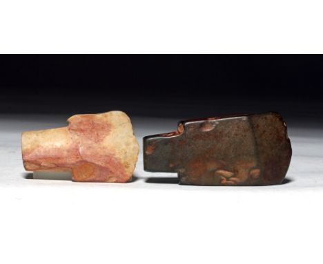 Laos, Neolithic, ca. 1000 BCE. This is a pair of axe heads / adzes (sometimes known as celts). One is a dark chert-like stone