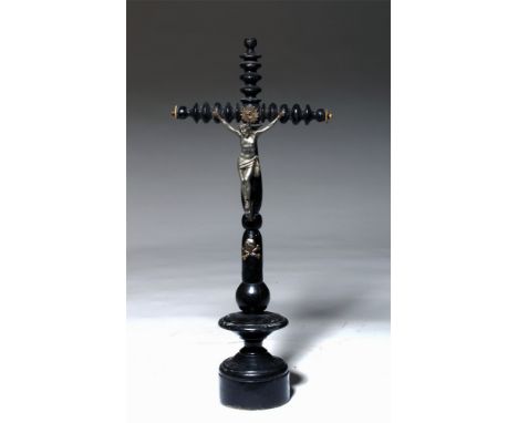 Latin America, Mexico, Spanish Colonial, ca. 19th century CE.  A beautiful, wooden cross, painted a lustrous black, with undu