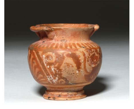 Magna Graecia, southern Italy, Apulia, ca. 325 BCE.  Cute pottery jar on short foot and twin handles at the rim, decorated on