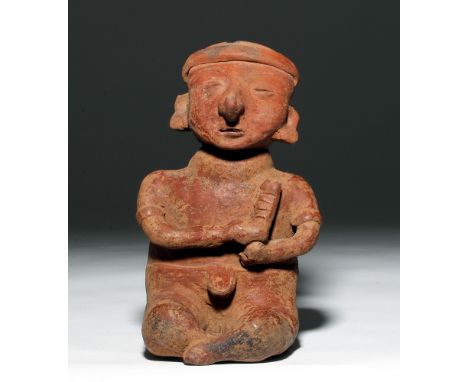 Pre-Columbian, West Mexico, Nayarit, Ixlan Del Rio ca. 200 BCE to 300 CE. This is a large seated pottery figure playing a ras