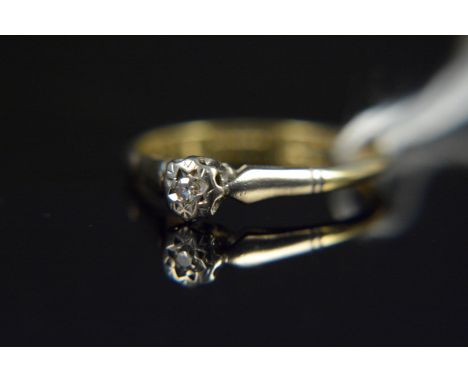 An 18ct gold illusion set solitaire diamond ring, size N, weight approx 2g