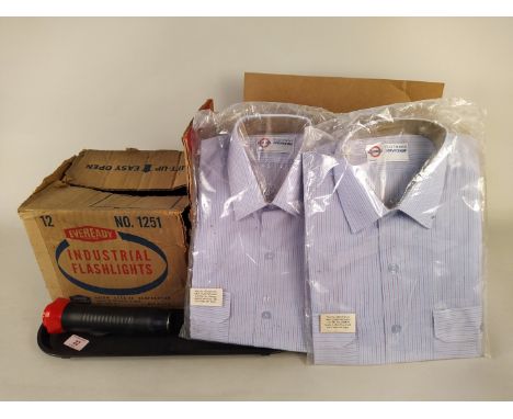 Six vintage boxed Ever Ready torch/flash lights plus eight packaged London Transport shirts, varying collar sizes