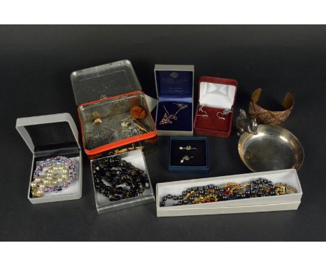 A mixed lot of costume jewellery including bead necklaces, a silver ring etc