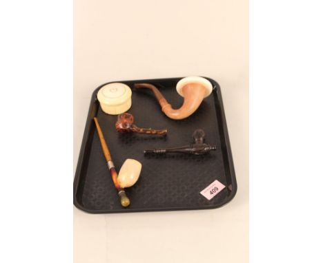 A vintage Calabash pipe, a carved wooden example, a Meerschaum pipe with white metal fittings and amber style stem, one other