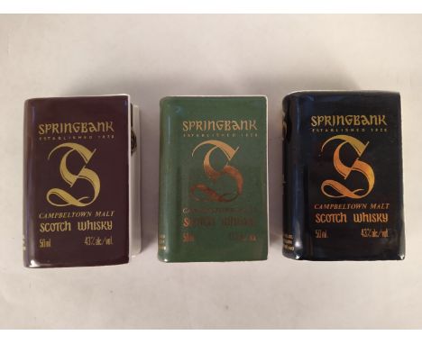 Three 50ml ceramic decanters in book form, Springbank Campbeltown Malt Scotch Whiskey, Volumes 1, 2 and 3, all seals intact