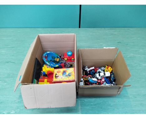 A box of vintage 80's toys plus a box of vintage Matchbox and Corgi die cast (all play used)