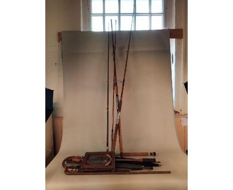 Vintage cane fishing rods, walking sticks, umbrella etc