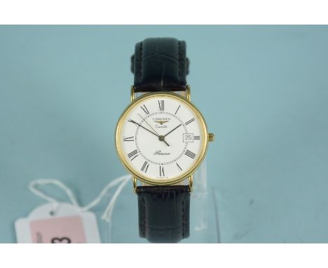 A late 20th Century 9ct gold quartz calendar wristwatch Longines Presence with centre seconds.  The quartz movement to a pain