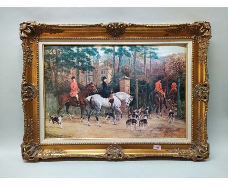 A gilt framed oleograph of the hunt entering the grounds of a country house, 50cm x 75cm