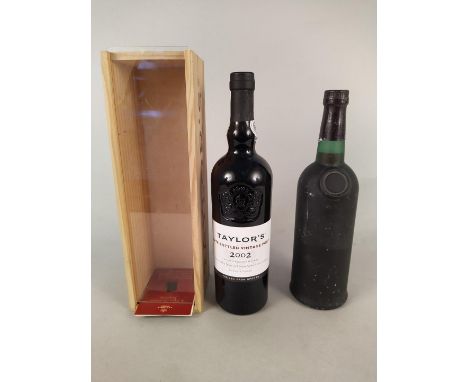 A cased 2002 Taylors late bottled vintage port together with Oporto bottle (lacking label)