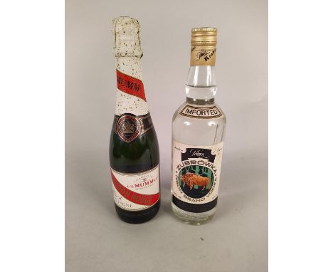 A vintage half litre Zubrowka Bison brand vodka together with a 375ml G.H. Mumm &amp; Co. Cordon Rouge champagne