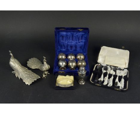 A mixed lot of silver and silver plate including engraved silver bangle, silver pepper pot, white metal bird models, a cased 
