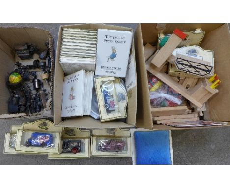 Seven model vehicles, Brio wooden train set, two coin sets, 1985 and 1988, Beatrix Potter books, four Wedgwood Beatrix Potter