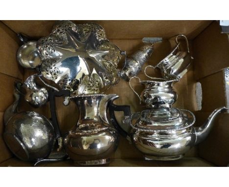 A Viners four piece plated tea service, a three piece hammered plated tea service, a plated shaker and a basket