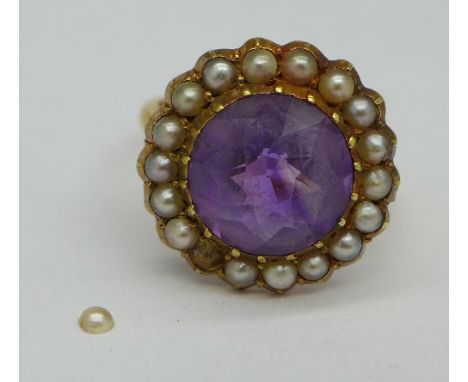 A 9ct gold, amethyst and seed pearl ring, one seed pearl loose, 4.8g, N