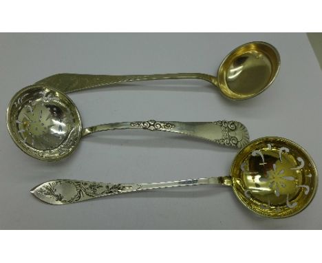 Two .830 silver sifters and a ladle; one sifter marked Bryde, 90g