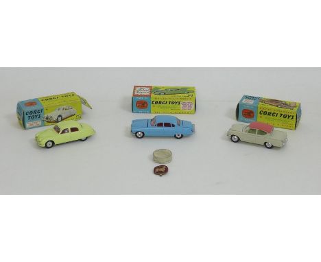 A group of three vintage Corgi model cars, comprising a near mint model of a Jaguar Mark X in powder blue, red interior, with