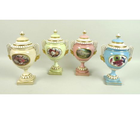A set of four modern Royal Worcester pedestal vases and covers, with twin moulded handles supported on face masks, shape numb