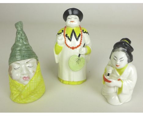 A group of three Royal Worcester candle snuffers comprising Mandarin, Japanese girl with a tangerine bowl and Mr Caudle, larg