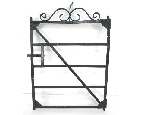 A vintage French garden gate, black painted cast metal with scrolling decoration, maker's plaque 'ETS Varin-Pichon Clotures, 