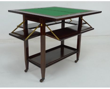 A late 19th or early 20th century rosewood card table with unusual four fold down shelves, marked Turner of Manchester, later